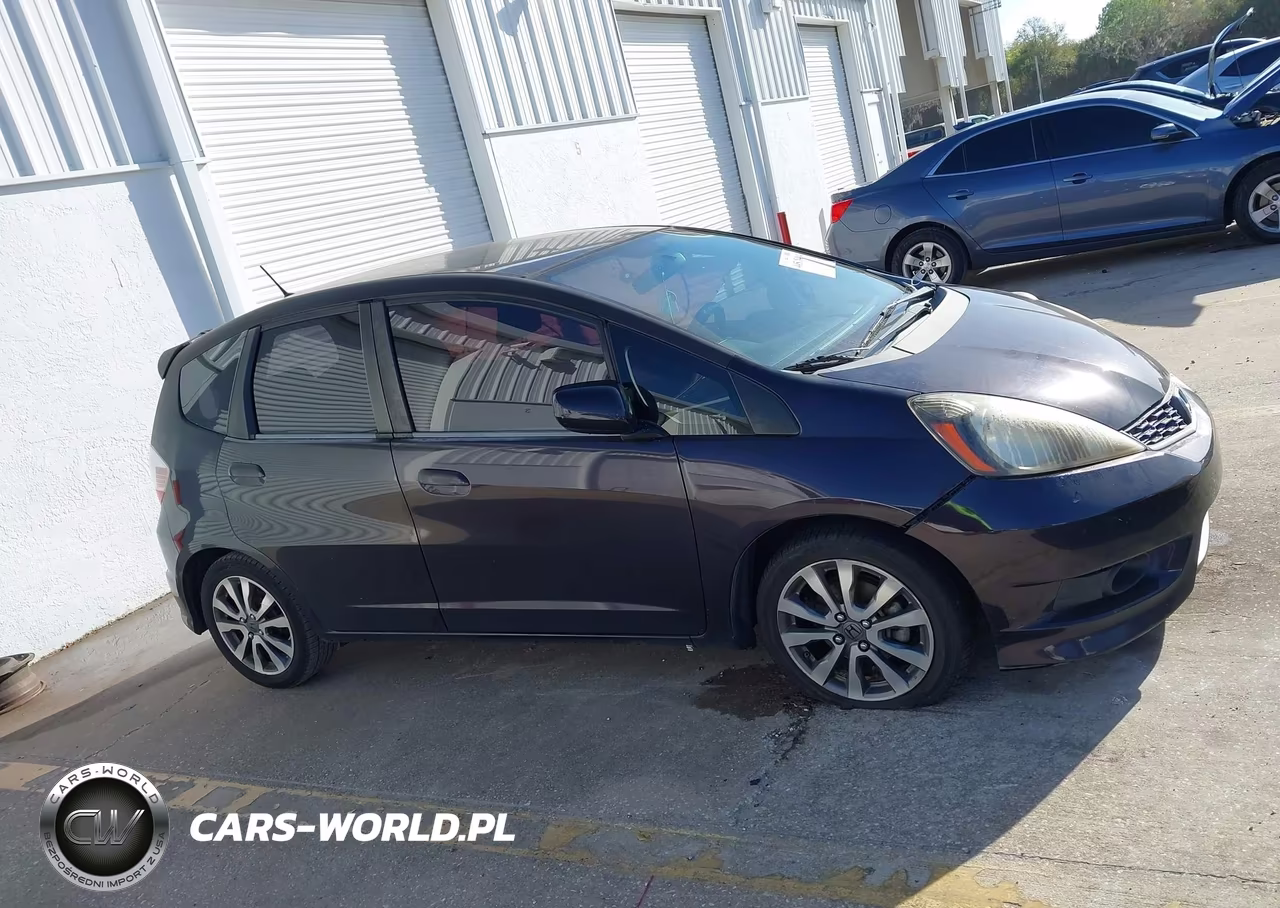 2013 Honda Fit Sport VIN:JHMGE8H59DC059095 - 13