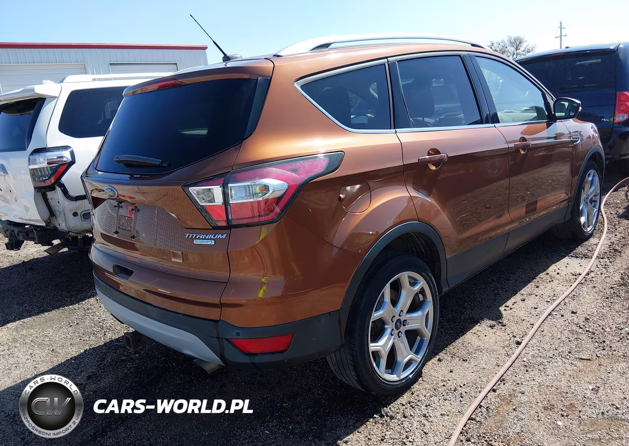2017 Ford Escape Titanium VIN:1FMCU0J99HUA61023 - 4