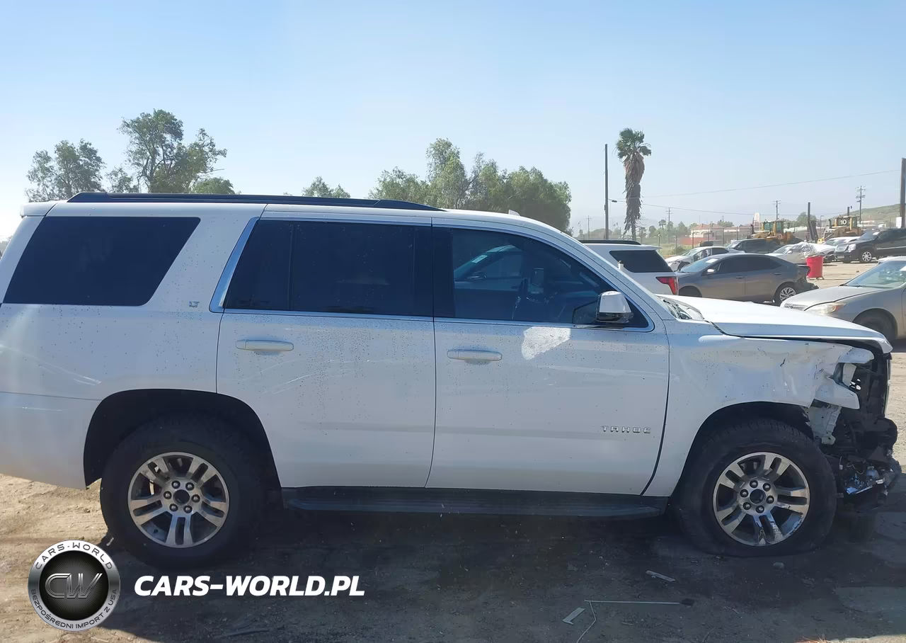 2019 Chevrolet Tahoe Lt VIN:1GNSCBKC8KR390080 - 14