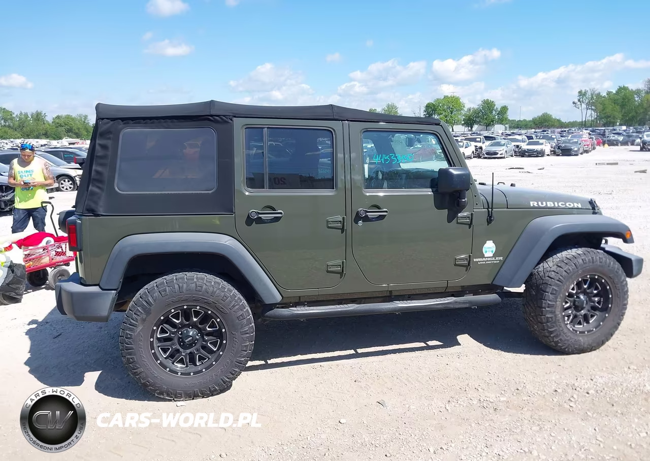 2015 Jeep Wrangler Unlimited Rubicon VIN:1C4BJWFG1FL777064 - 13