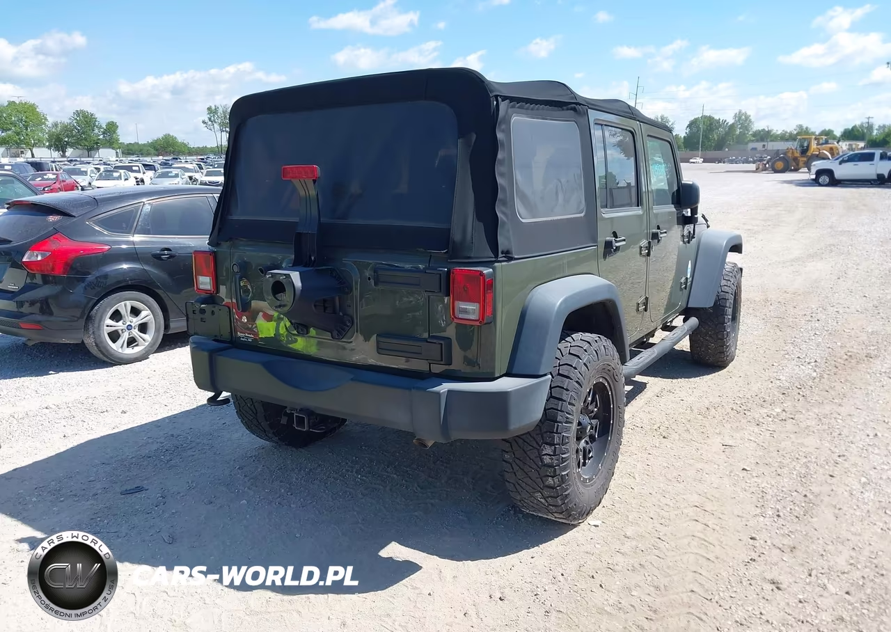 2015 Jeep Wrangler Unlimited Rubicon VIN:1C4BJWFG1FL777064 - 4