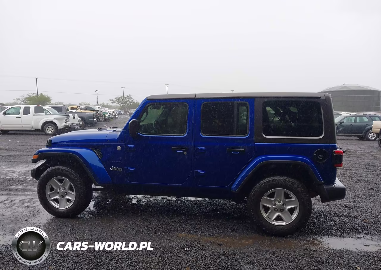 2019 Jeep Wrangler Unlimited Sahara 4X4 VIN:1C4HJXEG7KW561875 - 14