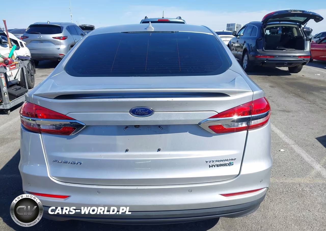 2019 Ford Fusion Hybrid Titanium VIN:3FA6P0RU8KR106426 - 16