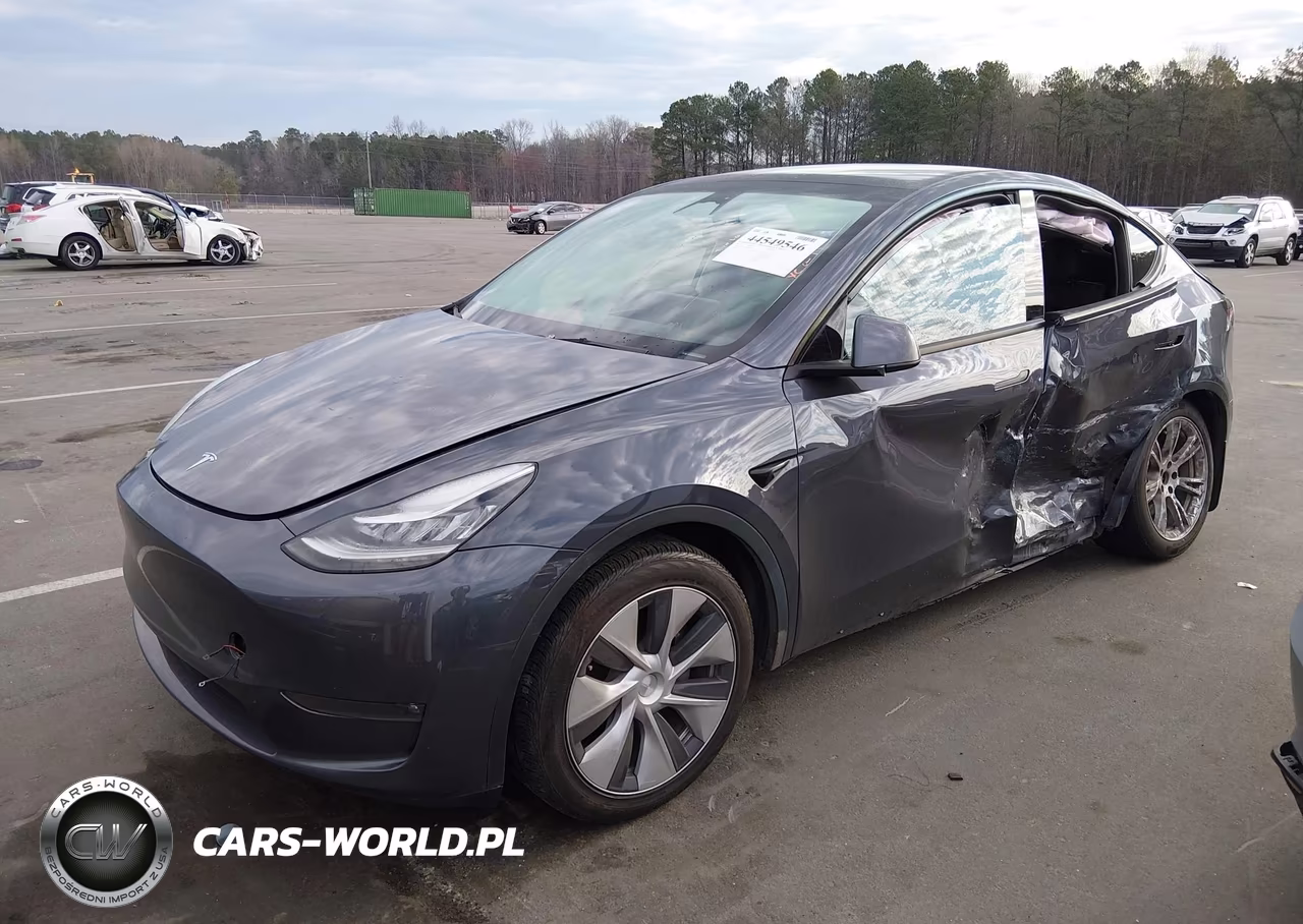 2023 Tesla Model Y Awd-Long Range Dual Motor All-Wheel Drive VIN:7SAYGDEE1PF599712 - 2