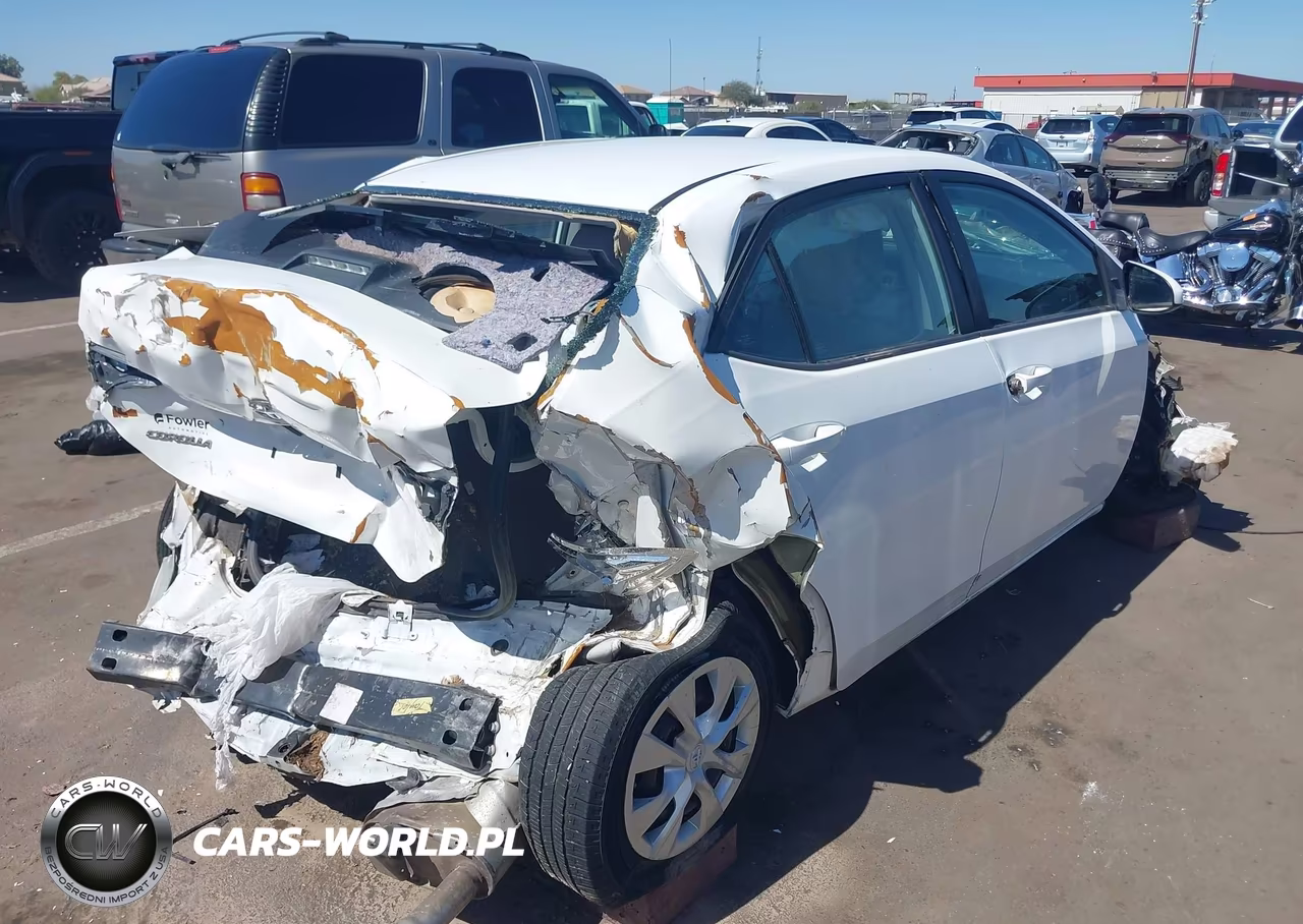 2017 Toyota Corolla L VIN:5YFBURHE2HP693429 - 4