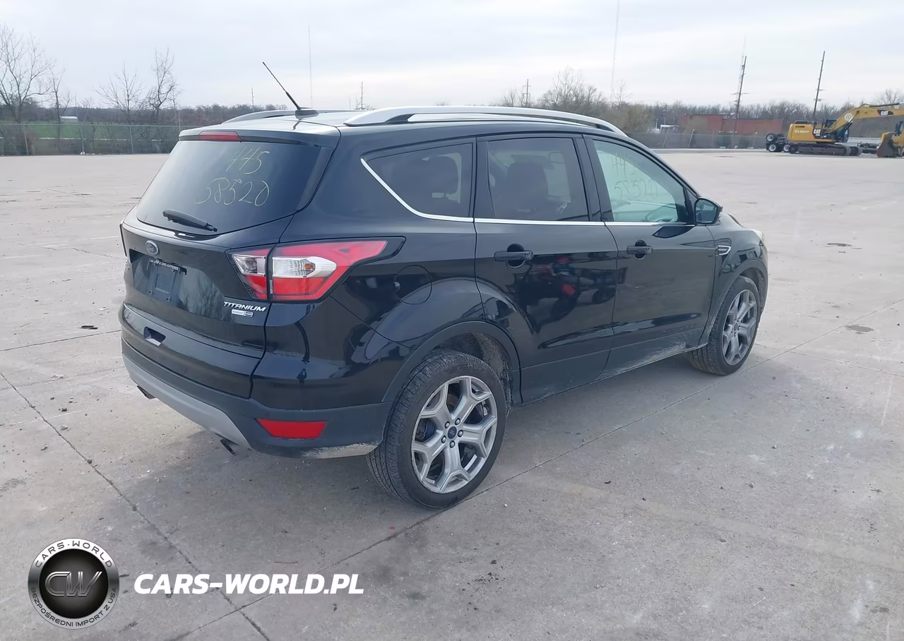 2017 Ford Escape Titanium VIN:1FMCU9J90HUC87603 - 4