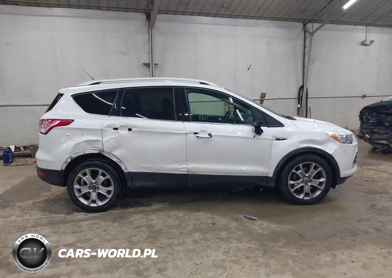 2016 Ford Escape Titanium VIN:1FMCU9JX2GUB12881 - 13