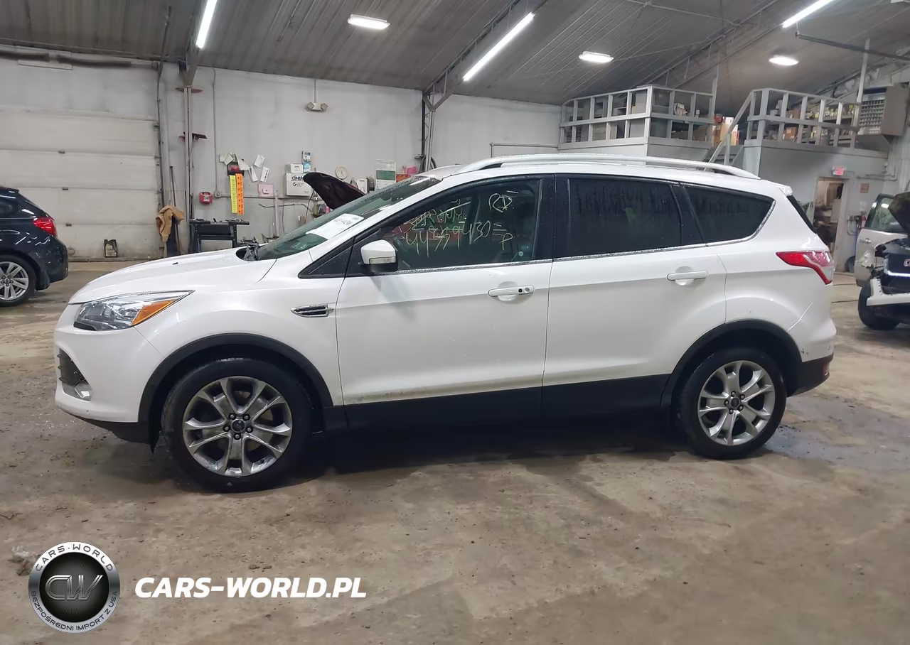 2016 Ford Escape Titanium VIN:1FMCU9JX2GUB12881 - 14