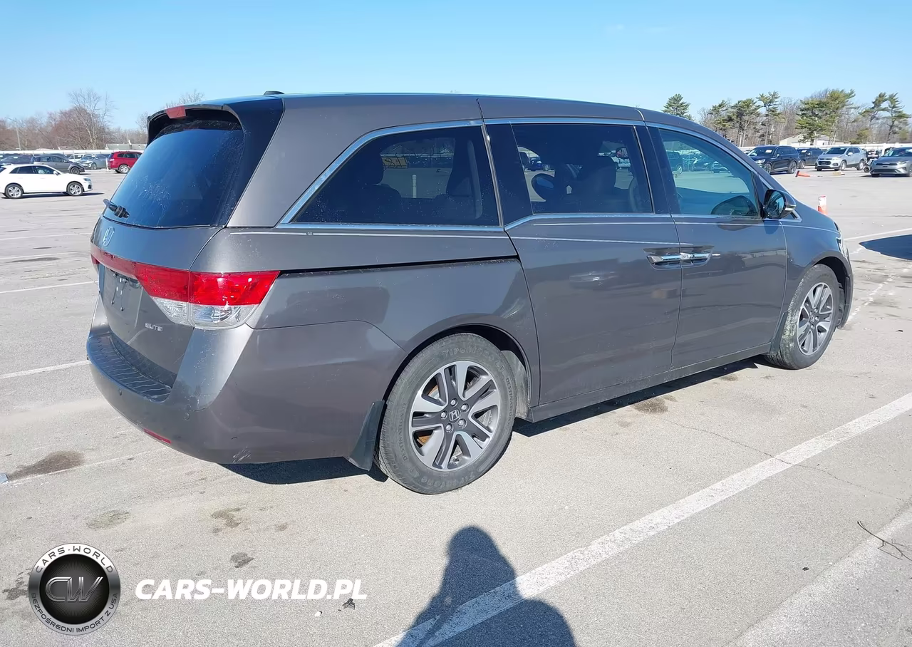 2014 Honda Odyssey Touring-Touring Elite VIN:5FNRL5H94EB038306 - 4