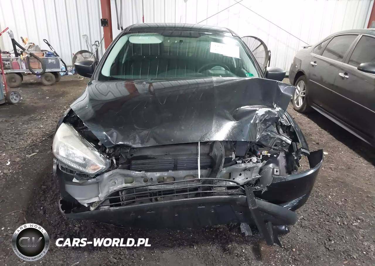 2015 Ford Focus S VIN:1FADP3E26FL353803 - 12