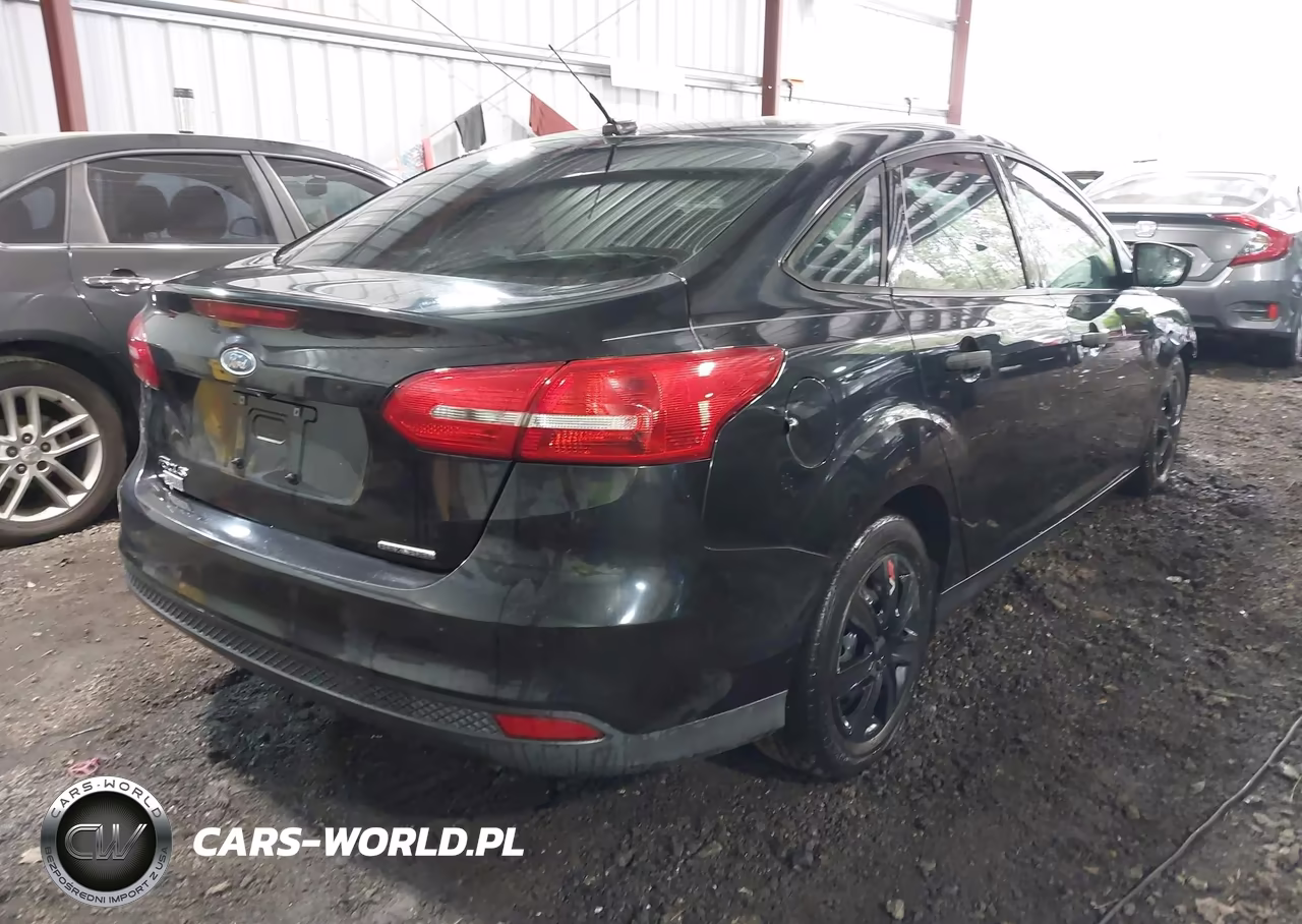 2015 Ford Focus S VIN:1FADP3E26FL353803 - 4
