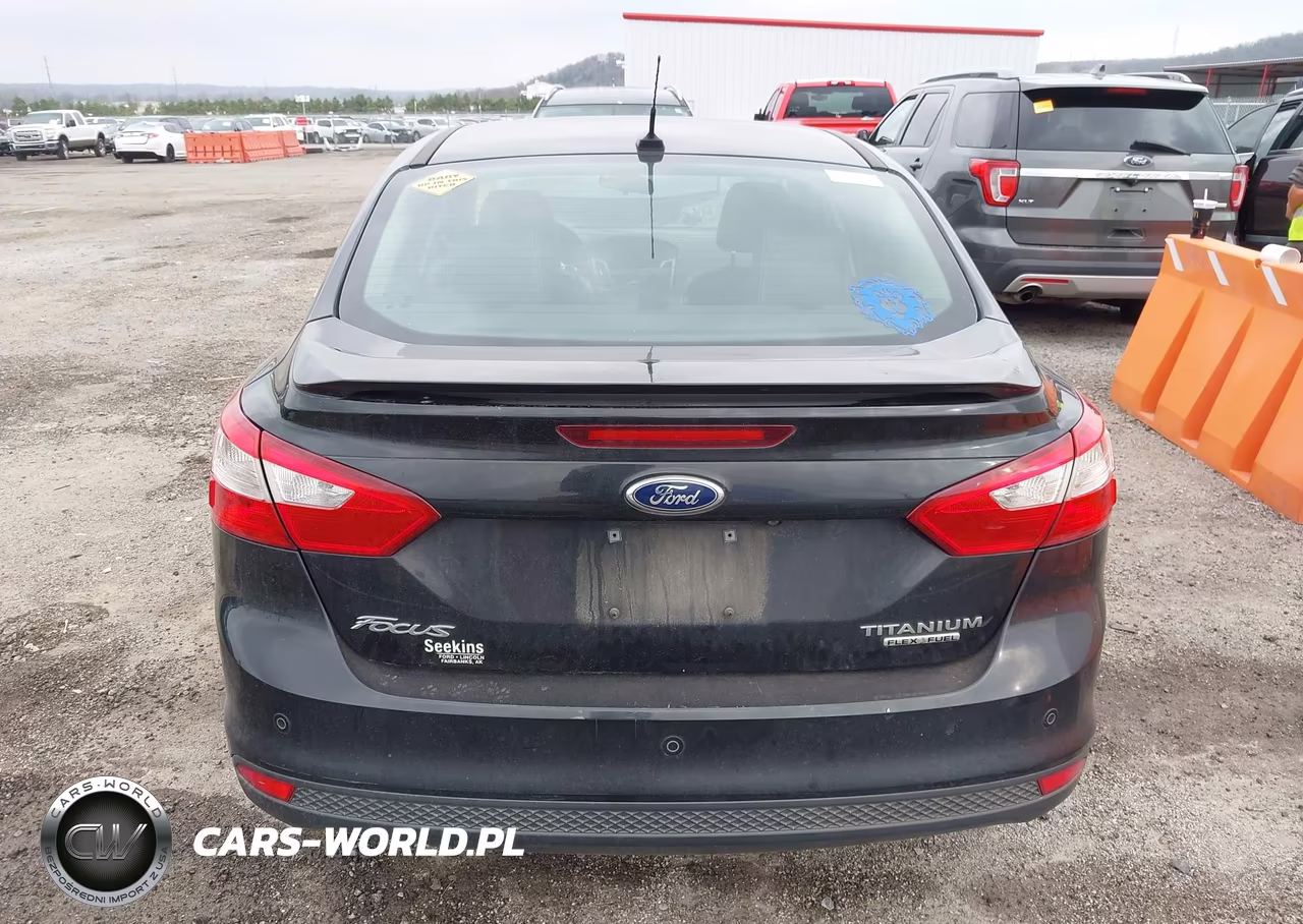 2014 Ford Focus Titanium VIN:1FADP3J27EL170379 - 16