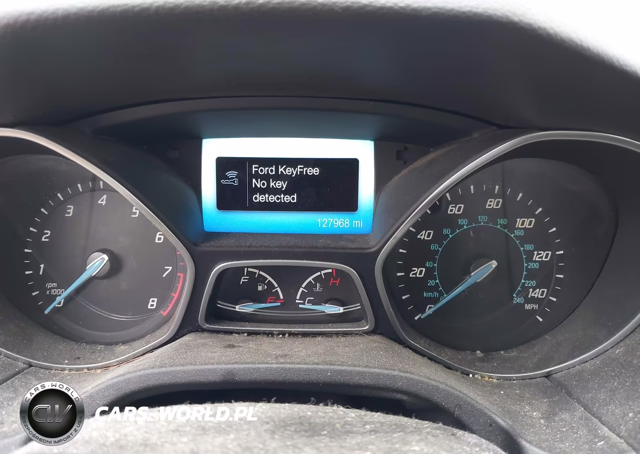 2014 Ford Focus Titanium VIN:1FADP3J27EL170379 - 7