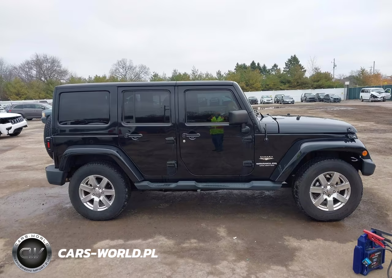 2012 Jeep Wrangler Unlimited Sahara VIN:1C4BJWEG9CL132305 - 13