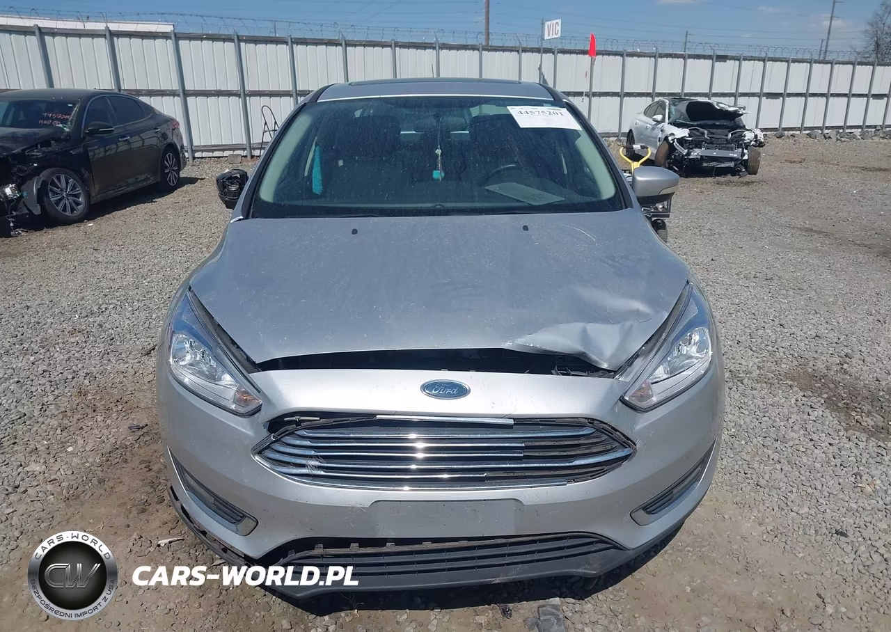 2017 Ford Focus Titanium VIN:1FADP3J24HL268368 - 12