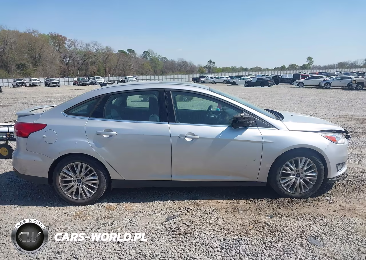 2017 Ford Focus Titanium VIN:1FADP3J24HL268368 - 13