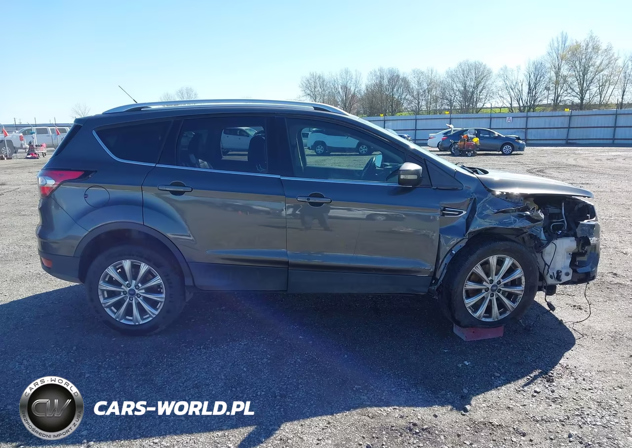 2017 Ford Escape Titanium VIN:1FMCU0J91HUF06757 - 13