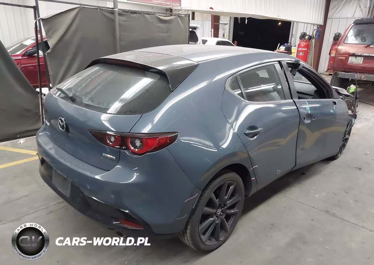 2022 Mazda Mazda3 Carbon Edition VIN:JM1BPALLXN1515556 - 4
