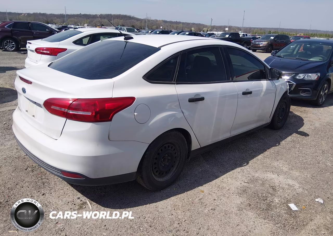 2017 Ford Focus S VIN:1FADP3E24HL282085 - 4