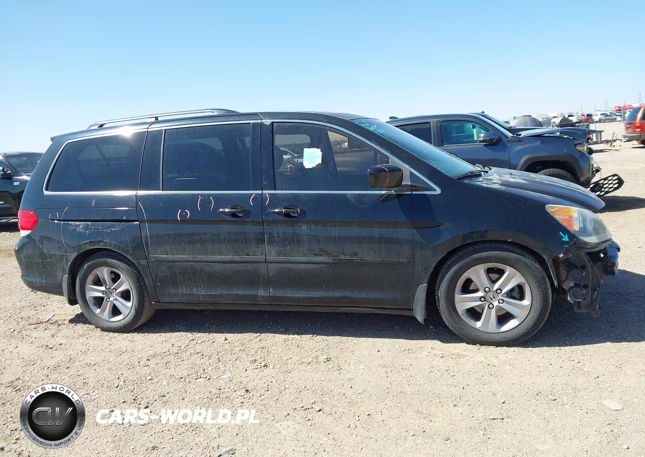 2010 Honda Odyssey Touring VIN:5FNRL3H99AB067914 - 14