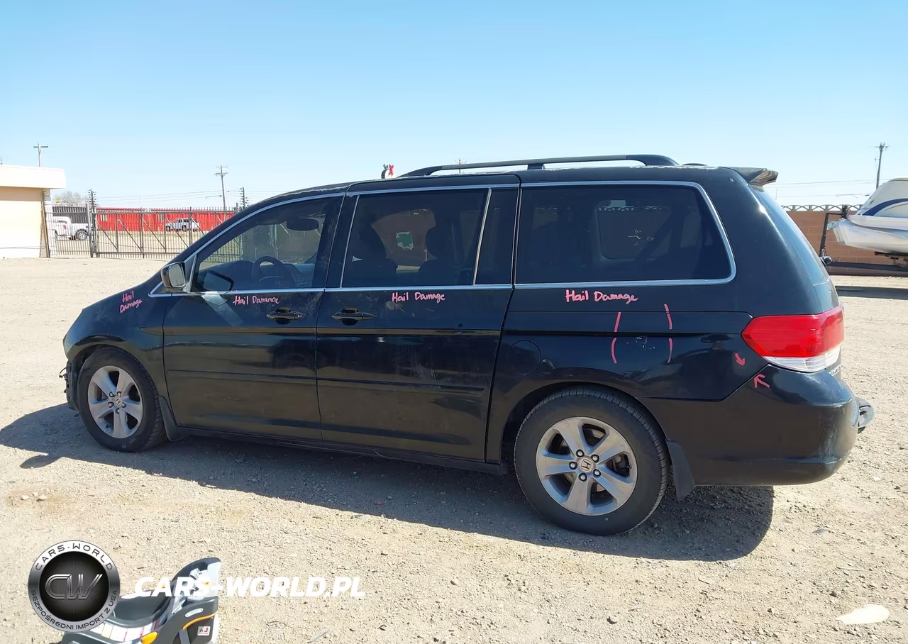 2010 Honda Odyssey Touring VIN:5FNRL3H99AB067914 - 15