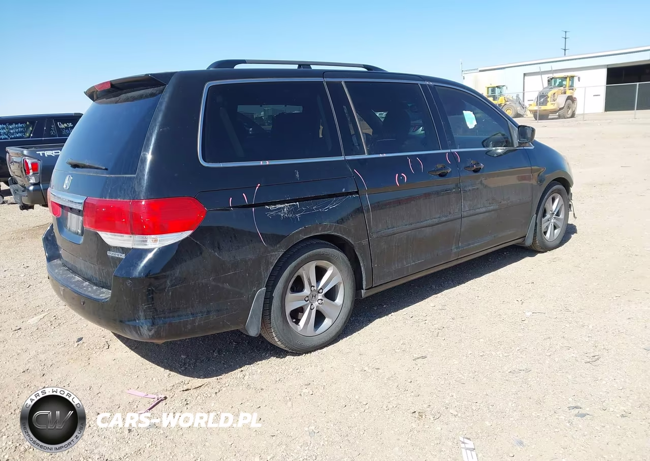 2010 Honda Odyssey Touring VIN:5FNRL3H99AB067914 - 4