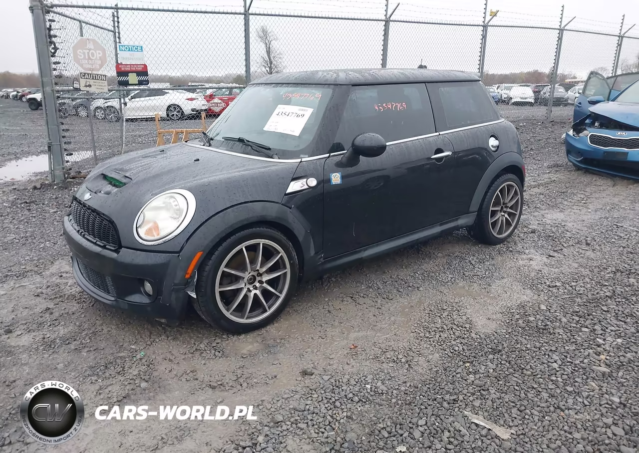 2007 Mini Cooper S VIN:WMWMF735X7TL83855 - 2