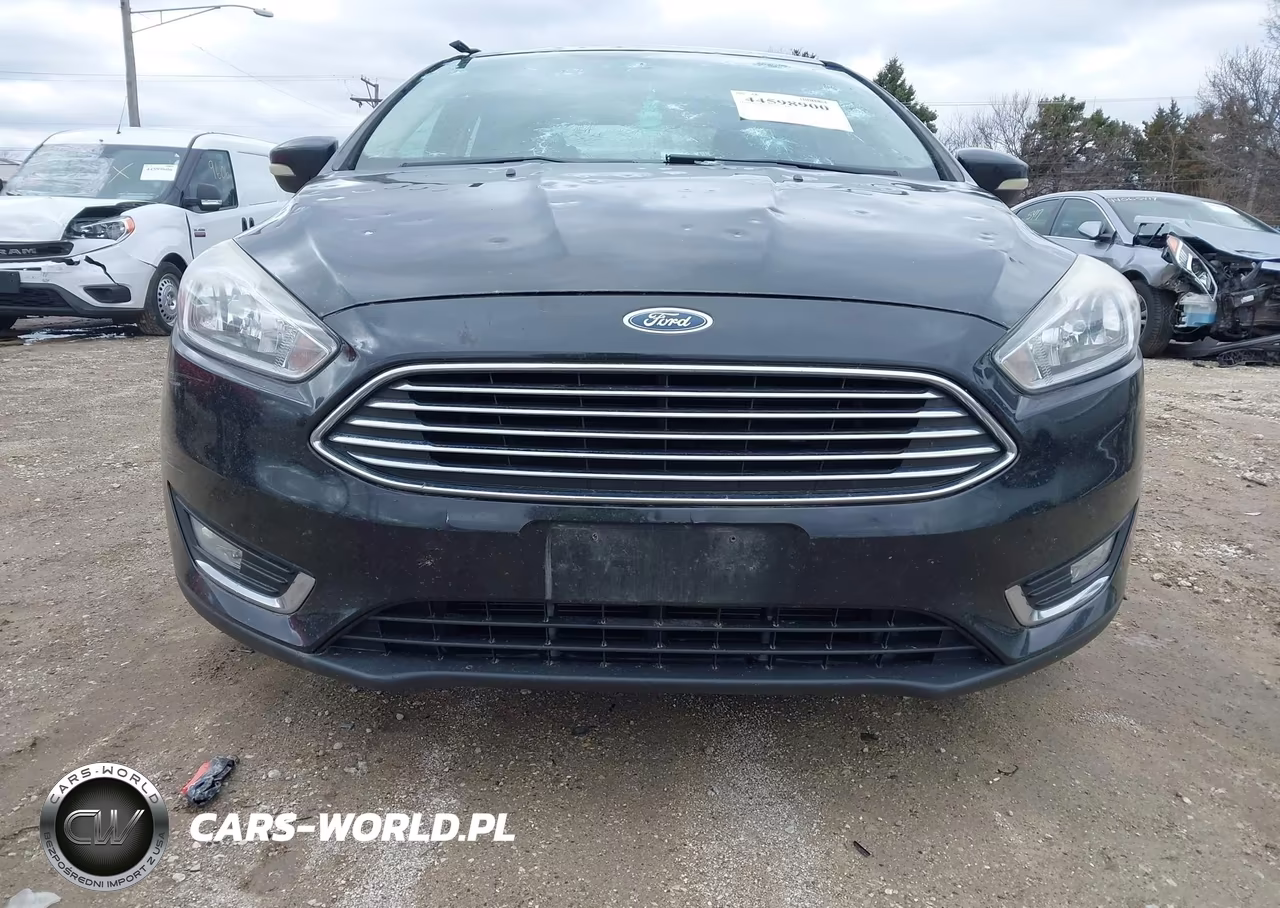 2015 Ford Focus Titanium VIN:1FADP3J20FL382848 - 12