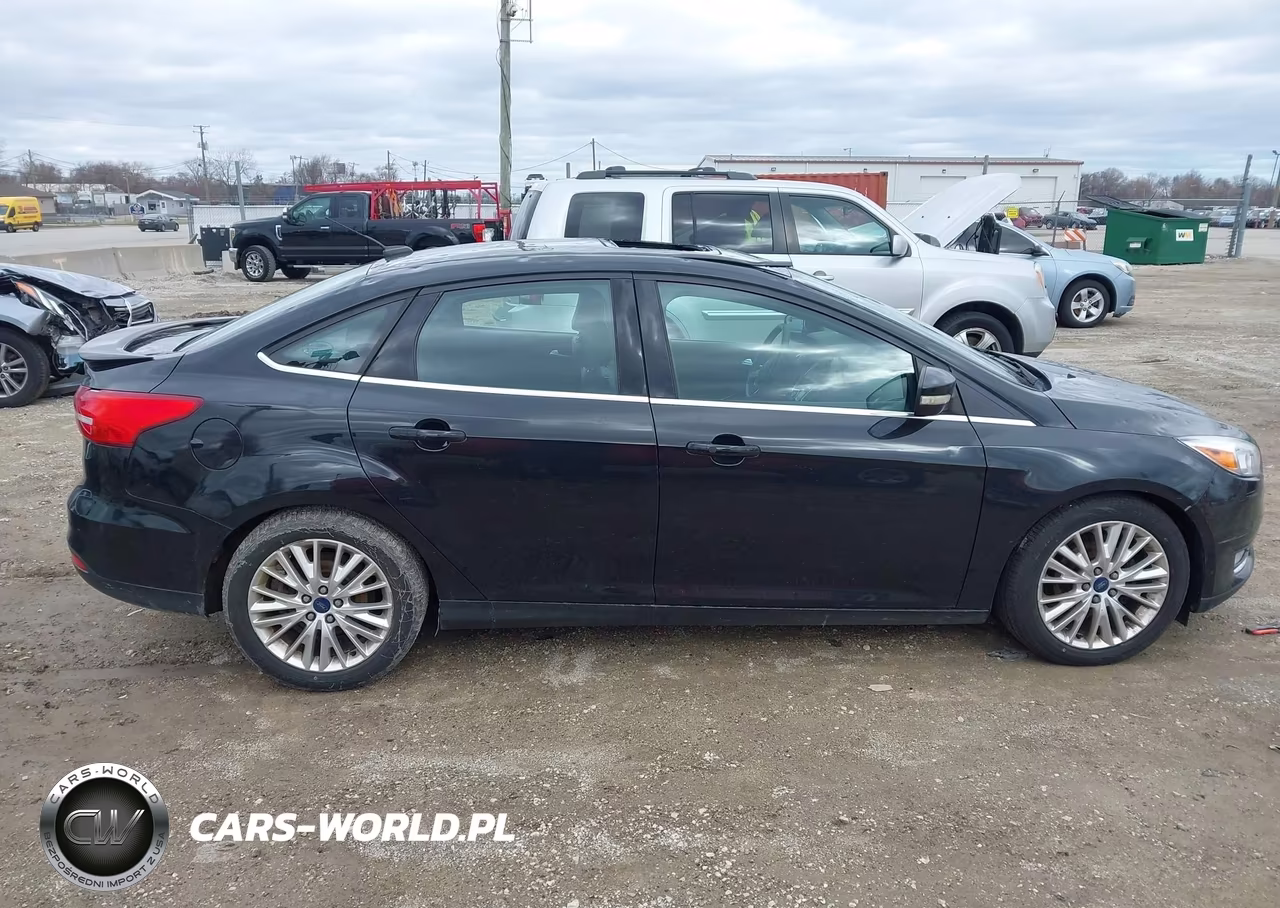 2015 Ford Focus Titanium VIN:1FADP3J20FL382848 - 13