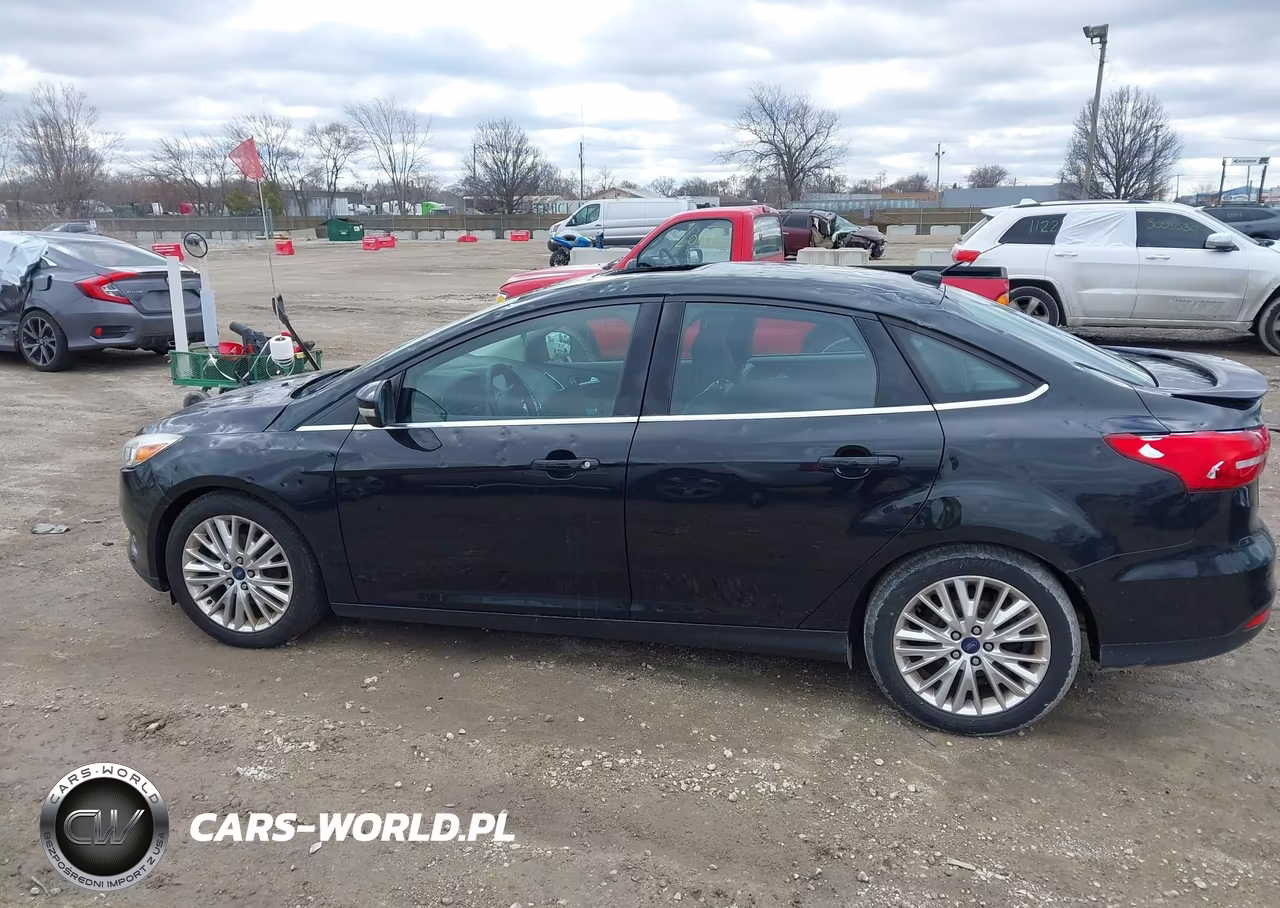 2015 Ford Focus Titanium VIN:1FADP3J20FL382848 - 14