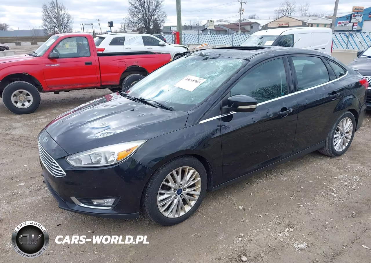 2015 Ford Focus Titanium VIN:1FADP3J20FL382848 - 2