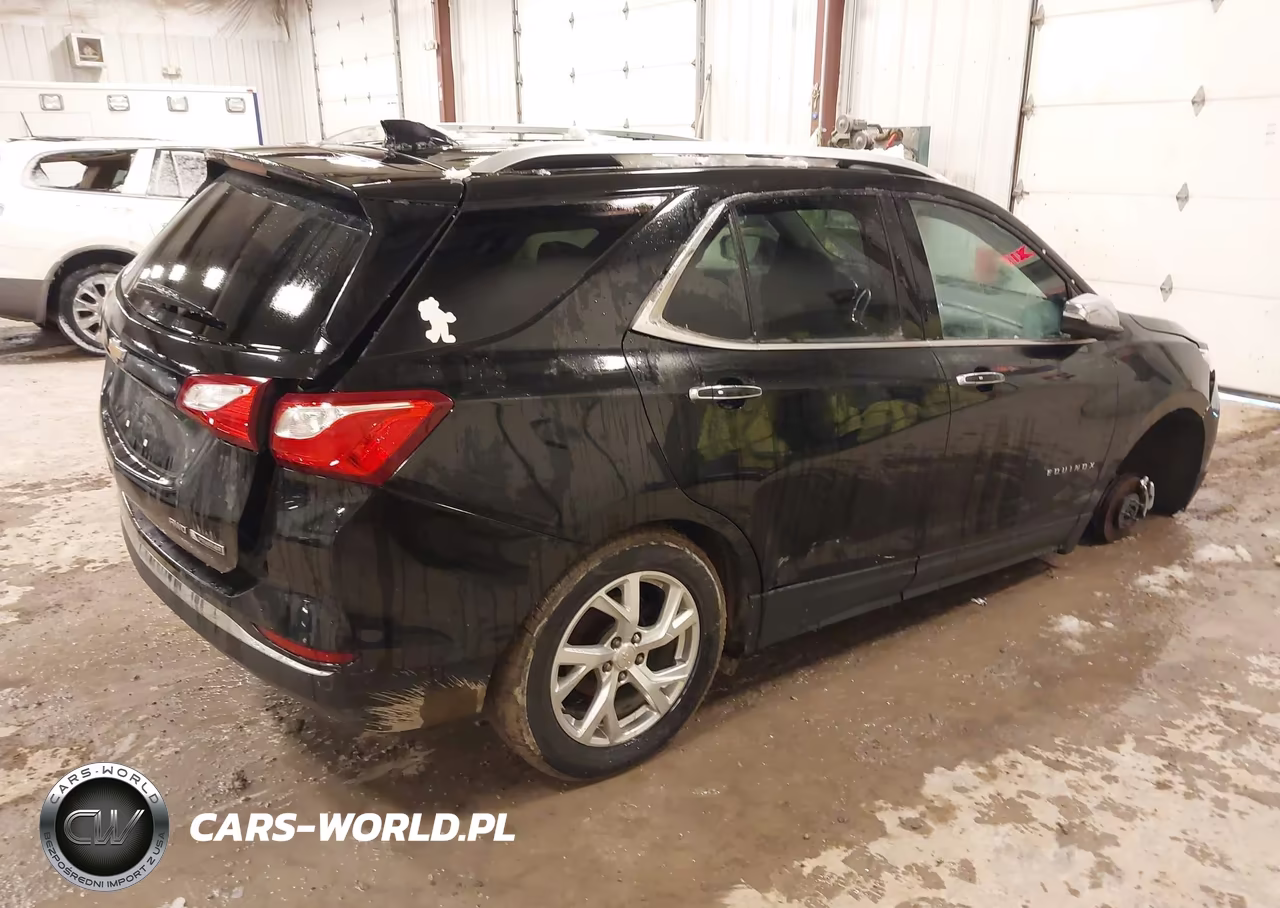 2018 Chevrolet Equinox Premier VIN:2GNAXVEV0J6235533 - 4