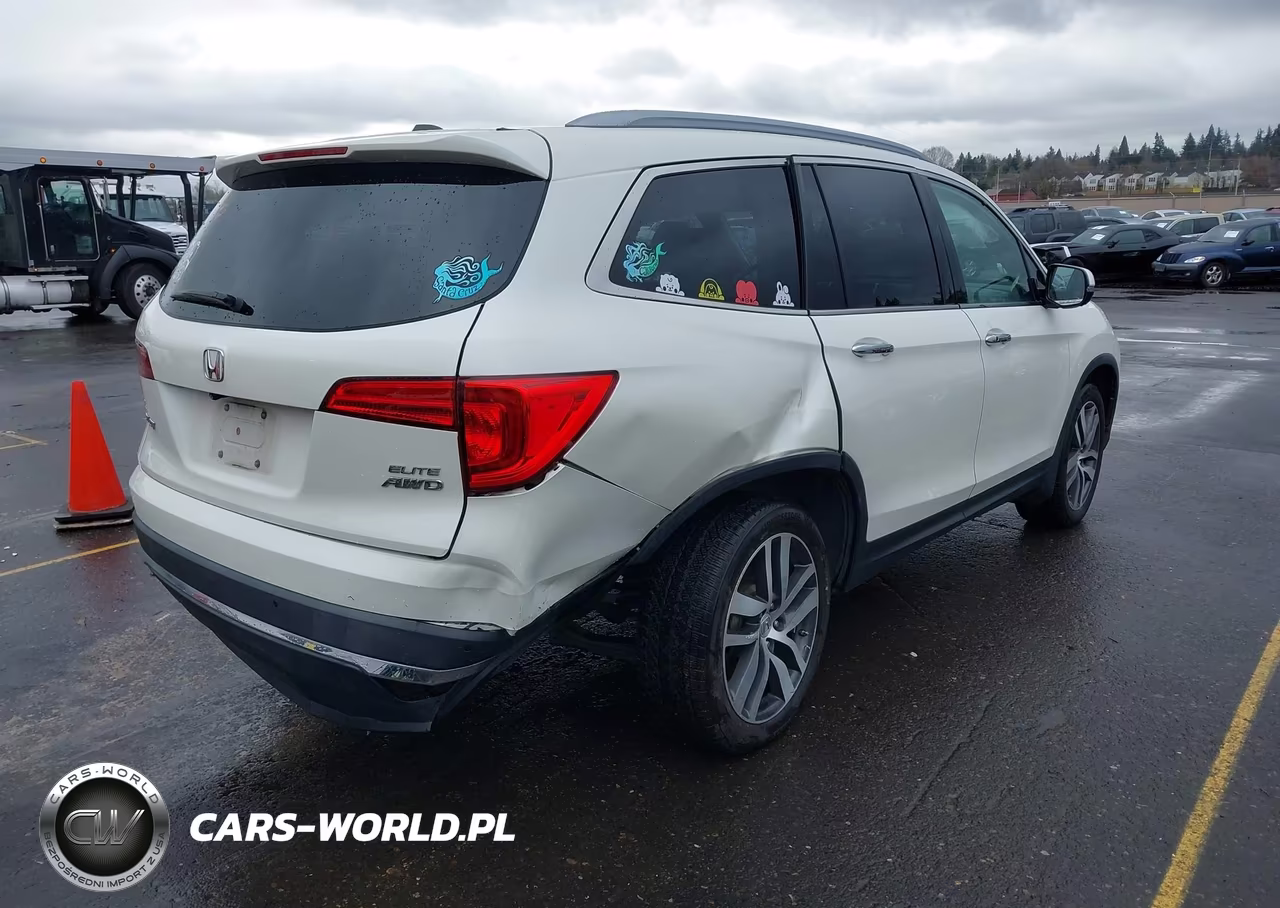 2018 Honda Pilot Elite VIN:5FNYF6H07JB001609 - 4