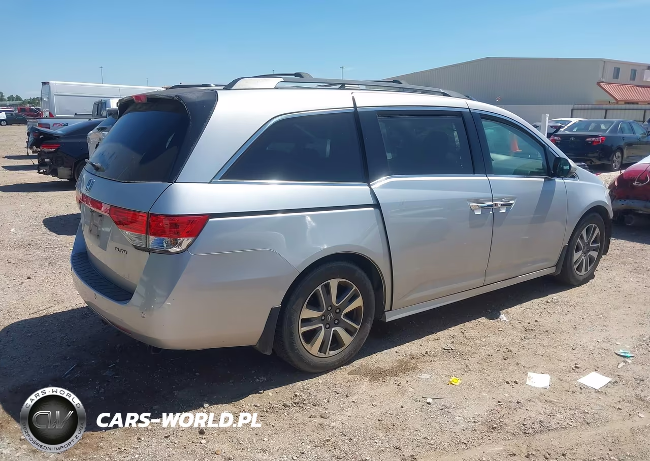 2015 Honda Odyssey Touring-Touring Elite VIN:5FNRL5H94FB041062 - 4