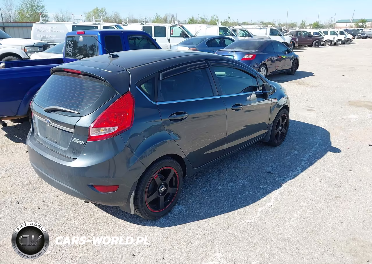 2011 Ford Fiesta Ses VIN:3FADP4FJ7BM134434 - 4