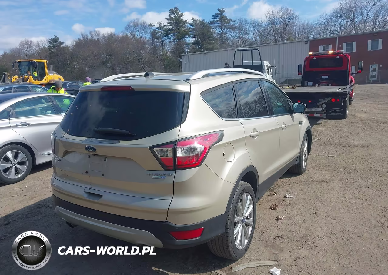2017 Ford Escape Titanium VIN:1FMCU9J99HUA56649 - 4