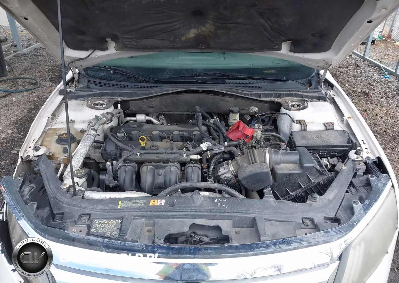 2012 Ford Fusion S VIN:3FAHP0GA2CR340497 - 10