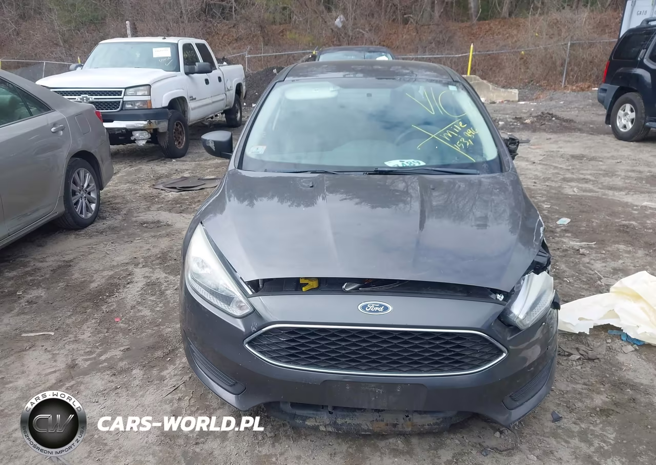 2016 Ford Focus S VIN:1FADP3E24GL256410 - 12