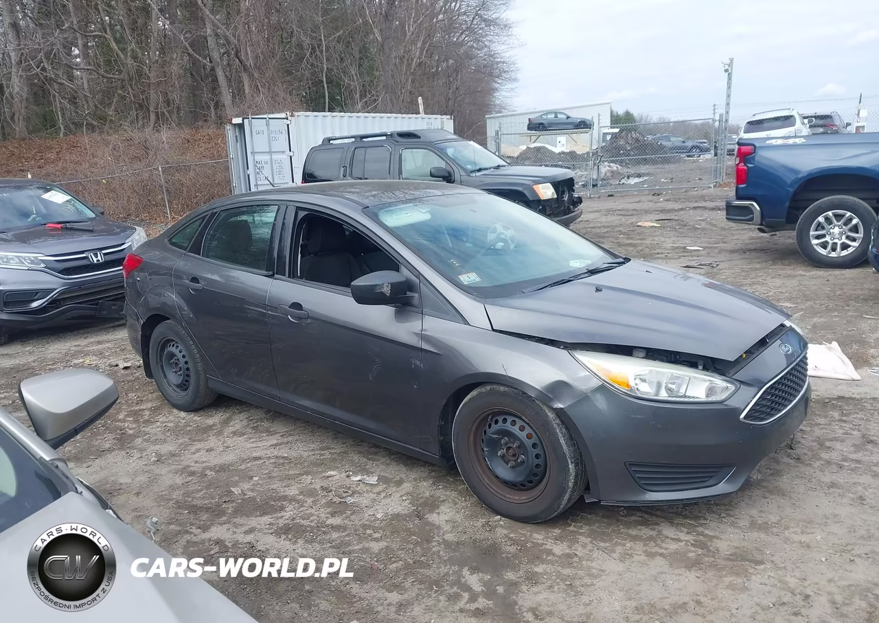 2016 Ford Focus S VIN:1FADP3E24GL256410 - 13