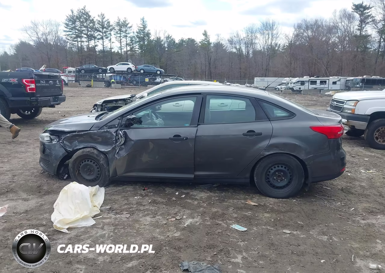 2016 Ford Focus S VIN:1FADP3E24GL256410 - 14