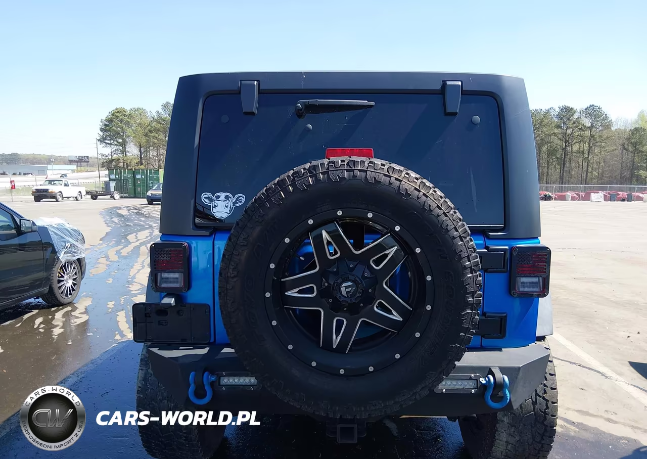 2015 Jeep Wrangler Unlimited Sport VIN:1C4BJWDG7FL518677 - 16