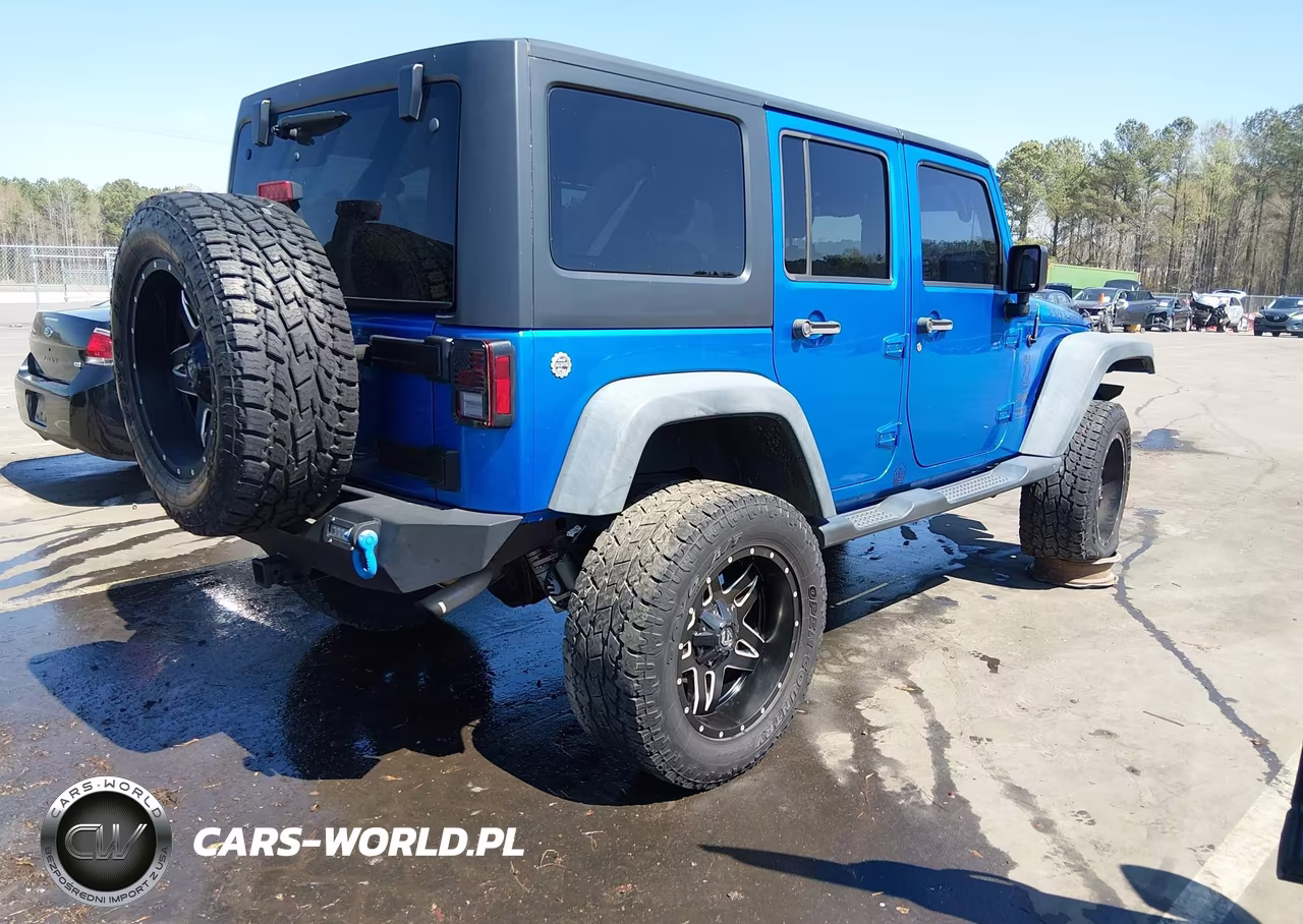 2015 Jeep Wrangler Unlimited Sport VIN:1C4BJWDG7FL518677 - 4