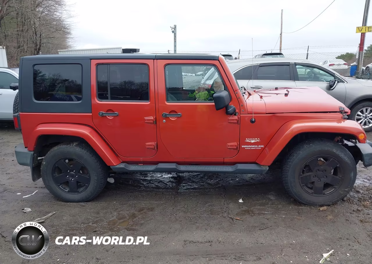 2009 Jeep Wrangler Unlimited Sahara VIN:1J4GA59179L708823 - 13