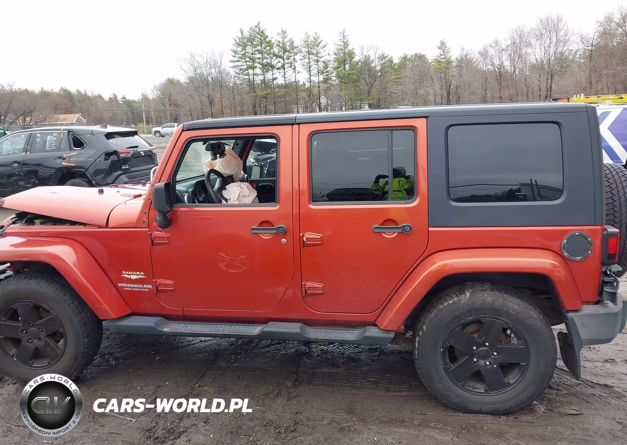2009 Jeep Wrangler Unlimited Sahara VIN:1J4GA59179L708823 - 14