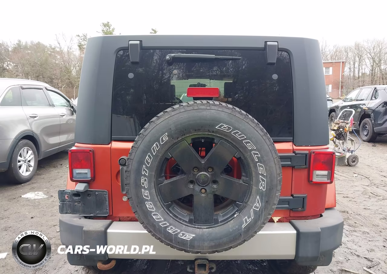 2009 Jeep Wrangler Unlimited Sahara VIN:1J4GA59179L708823 - 16