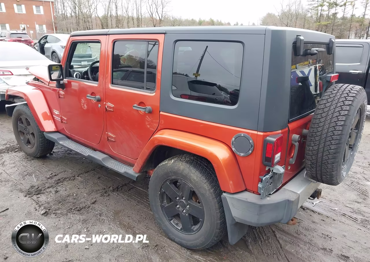 2009 Jeep Wrangler Unlimited Sahara VIN:1J4GA59179L708823 - 3