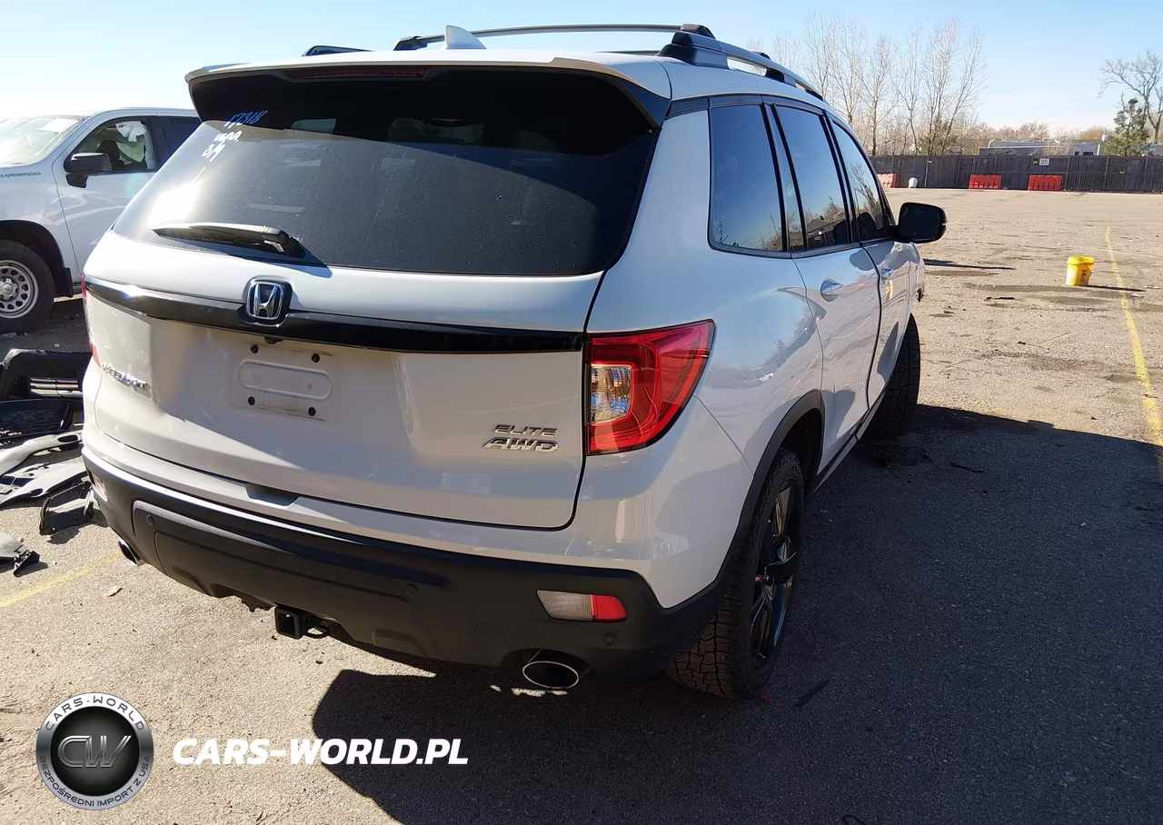 2019 Honda Passport Elite VIN:5FNYF8H02KB028066 - 4