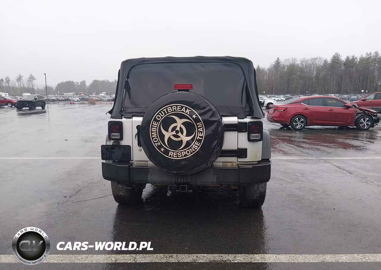 2011 Jeep Wrangler Sport VIN:1J4AA2D12BL514041 - 16