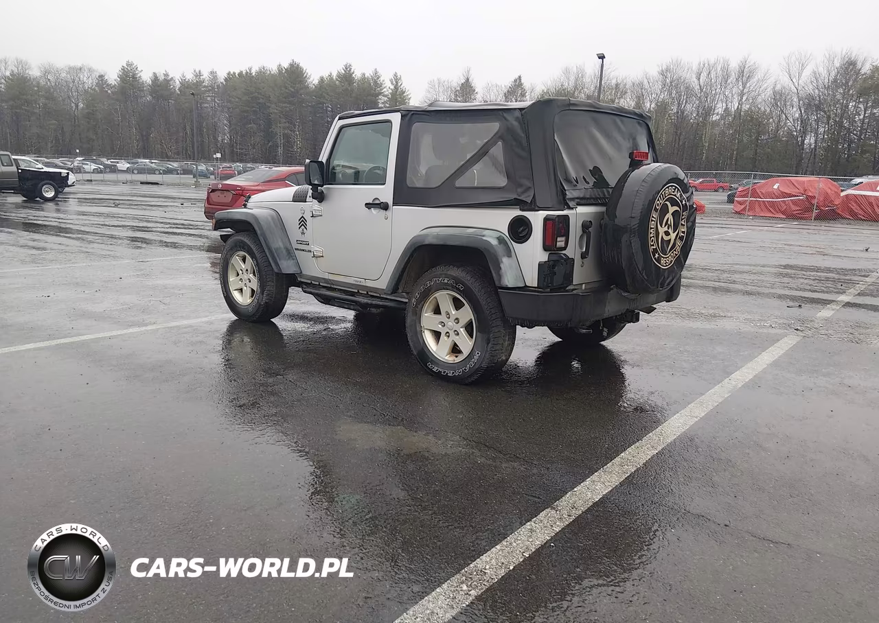 2011 Jeep Wrangler Sport VIN:1J4AA2D12BL514041 - 3