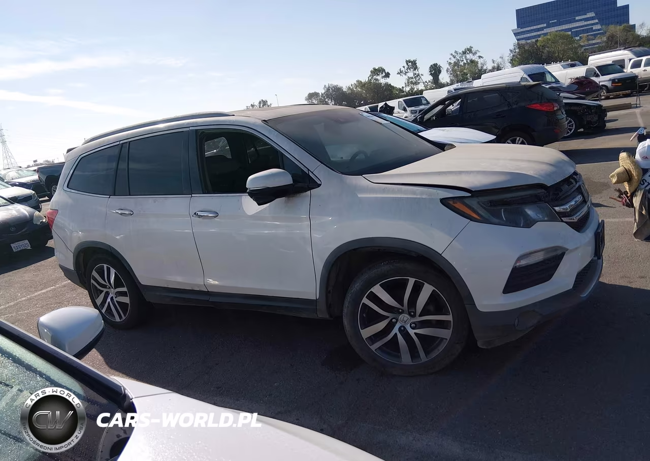 2016 Honda Pilot Touring VIN:5FNYF5H99GB051395 - 12